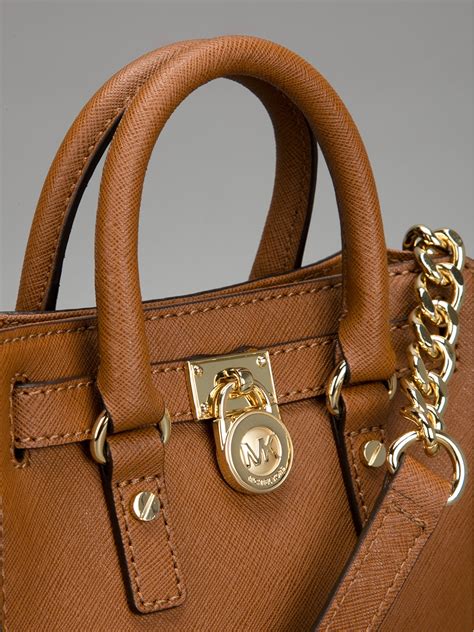 tan Michael Kors bag